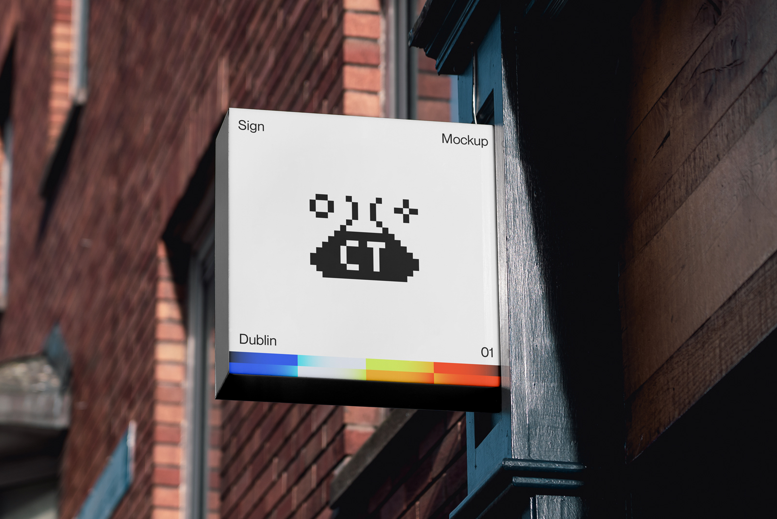 Urban signboard mockup hanging on a building wall with a pixel art design display in an outdoor setting, ideal for showcasing branding designs.